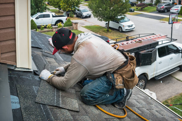 Professional Flat Roof Repair technician working in Andover, OH